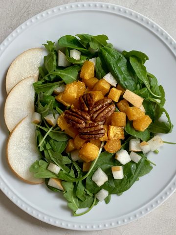 Roasted butternut squash with pear and pecan salad
