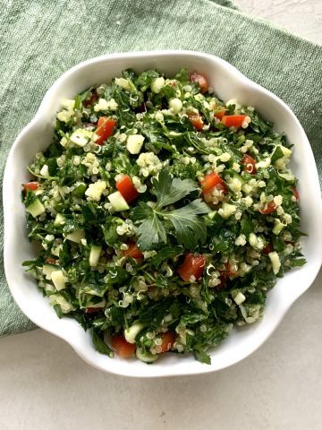 A bowl of quinoa tabbouleh salad