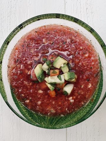 Spicy Watermelon Gazpacho in a green edged bowl